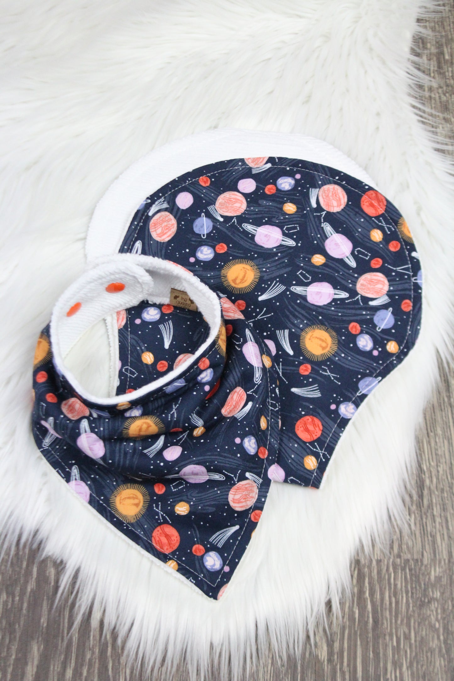 Planets Bibdana and Burp Cloth